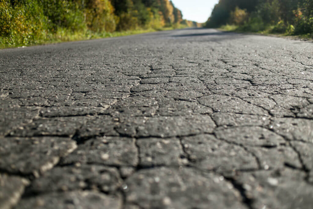 3 Signs Your Asphalt Pavement Needs Concrete Repairs Garrett Concrete